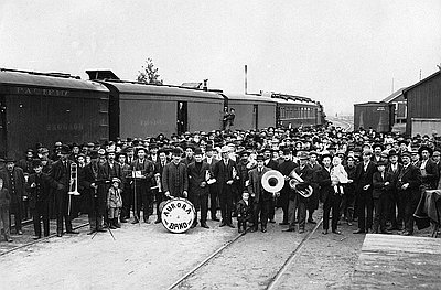 Aurora Band Greets Southern Pacific Farm Train