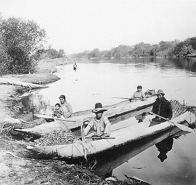 Klamath Indians in Dugout Canoes