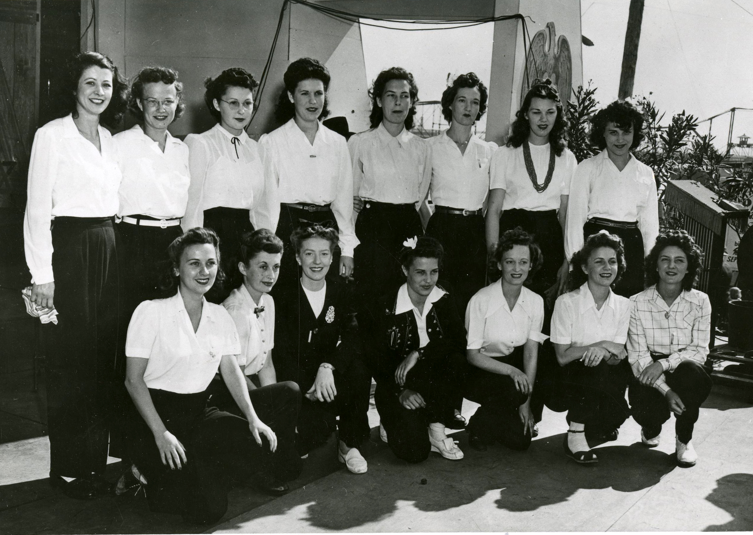Women were encouraged to compete in events like shipyard beauty contests, such as this one in the Vancouver Kaiser shipyard. The events were photographed and published in the employee newsletters. Some women enjoyed the events; others found them degrading because they had nothing to do with the work they were doing. Beauty contests--and other events that focused on women's looks--were part of the attempt by wartime industries to maintain gender distinctions at a time when being a man or a women meant very little on the job.