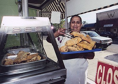 Latina Baker with Chicharrones de Puerco